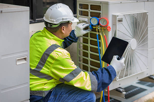 Professional Air Conditioning Repair technician working in Saunderstown, RI